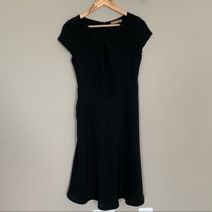 Combipel-women’s midi black bow dress.